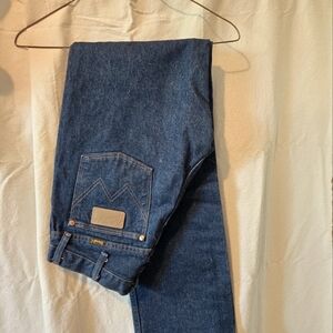 Wranglers 29x34 men's cowboy cut. Dark denim, new no tags.
